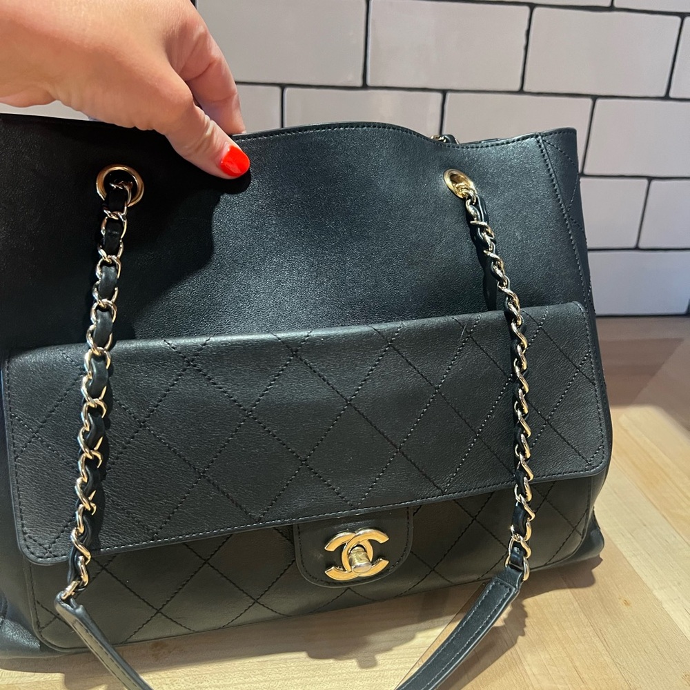 CHANEL Black Shoulder Bag with Gold Accents